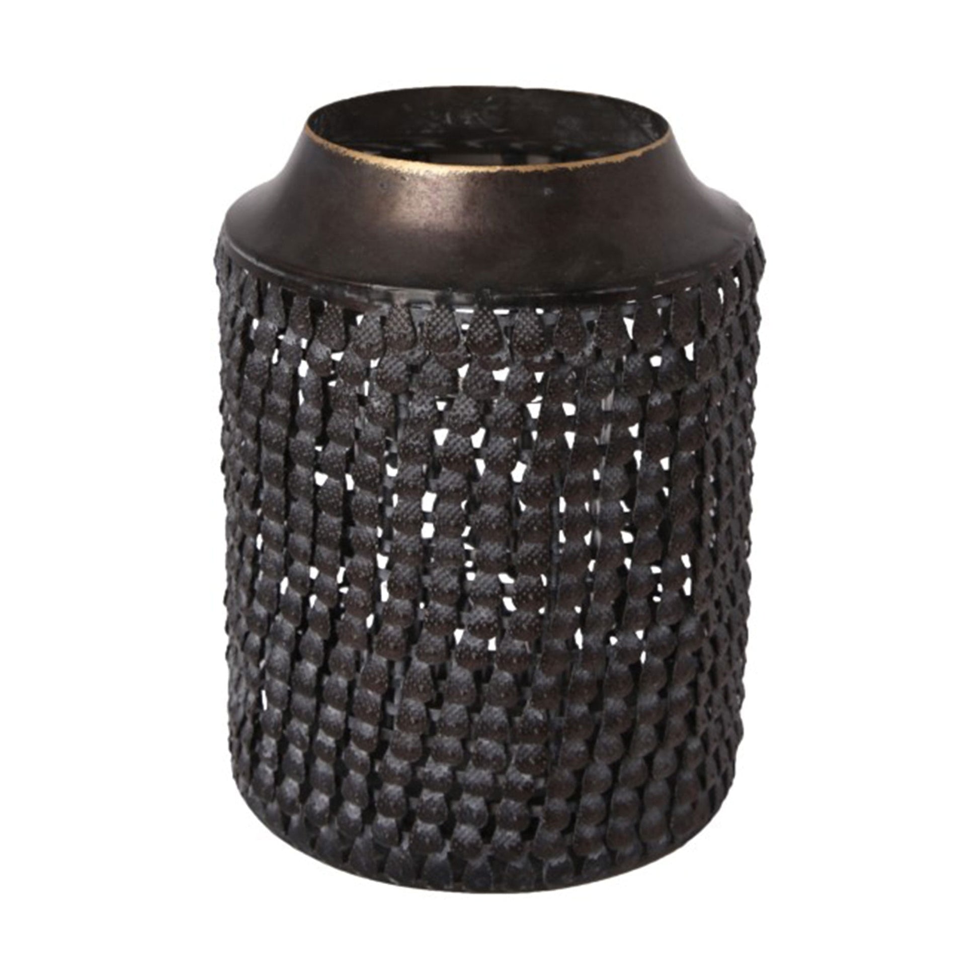 Rundes Windlicht mit einem Lochmuster, das Schatten an die Wand wirft. Entdecke die orientalischen Windlichter aus Aluminium von C´est Bon