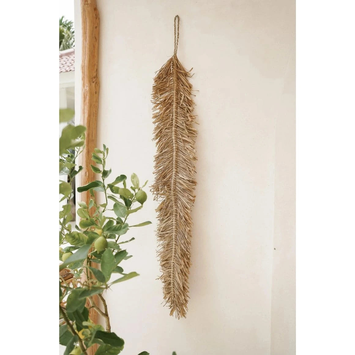 Detail der länglichen Wanddeko im Boho Stil