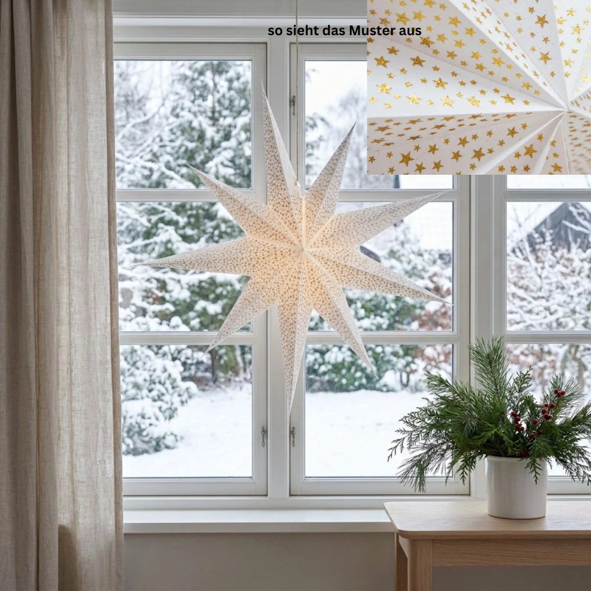 Papierstern weiss-Gold Blickfang als Statement in der Weihnachtsbeleuchtung im Fenster innen