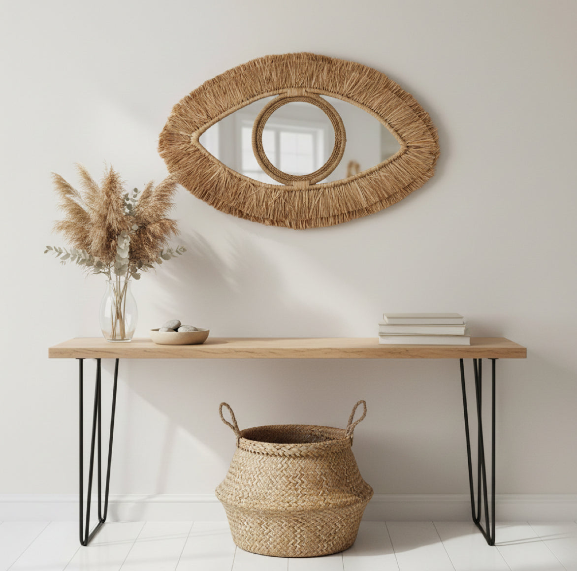 Spiegel aus Marokko als Wandspiegel Auge aus Raffia-Bast im Boho-Stil.